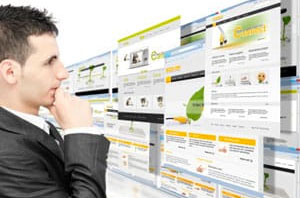 man looking at website designs